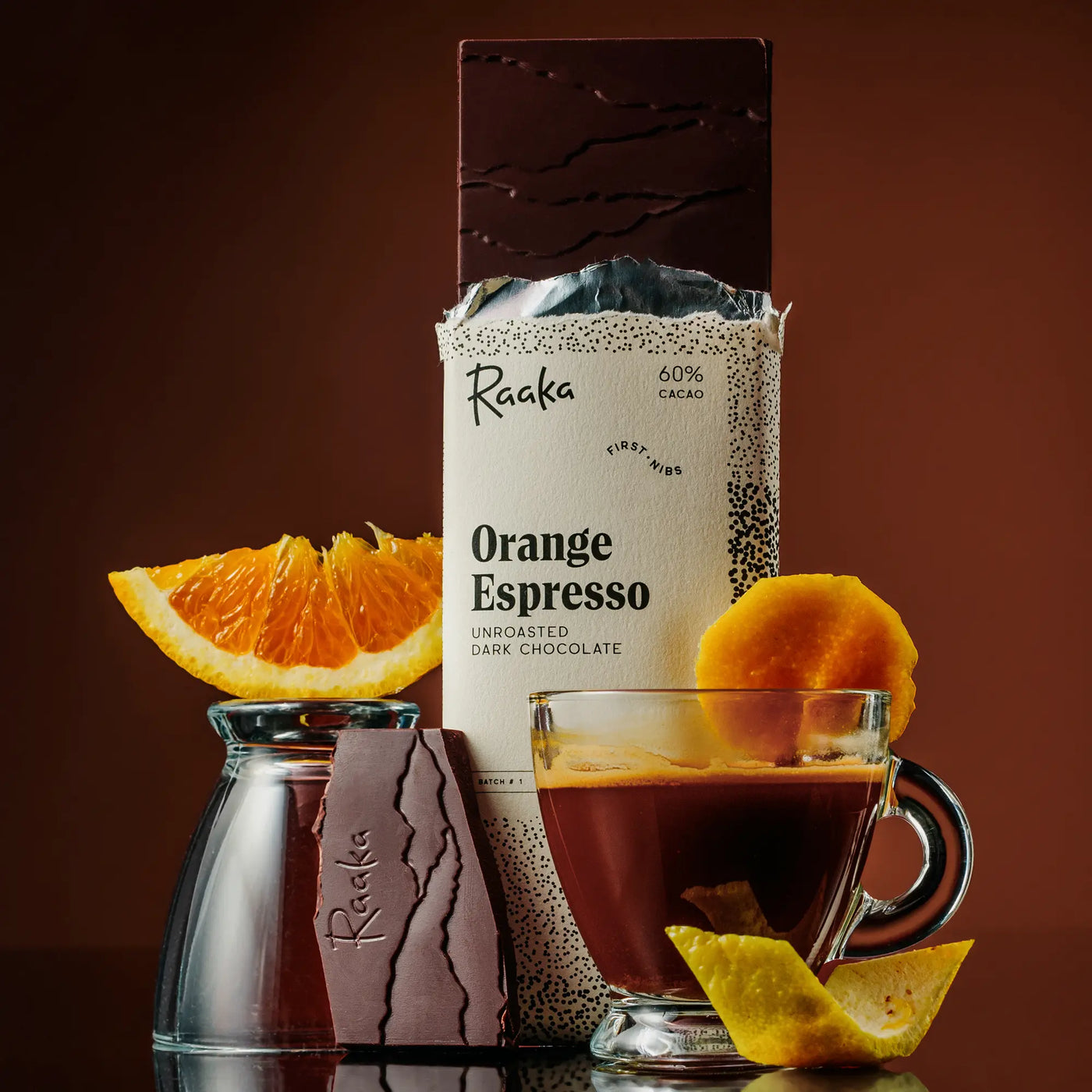 Orange Espresso bar with orange slices and espresso cups.
